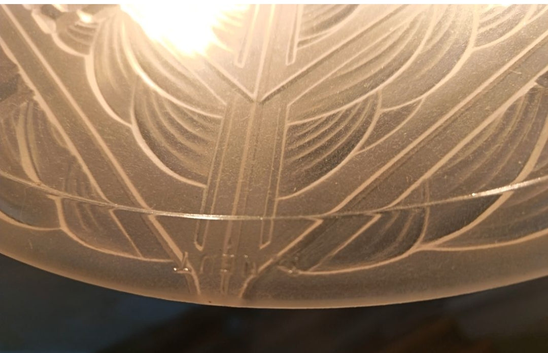 Lustre signé André Neut